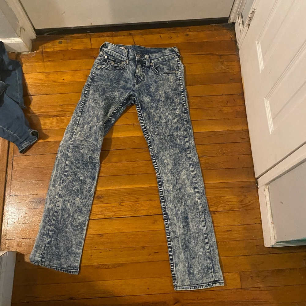 Acid wash blue jeans